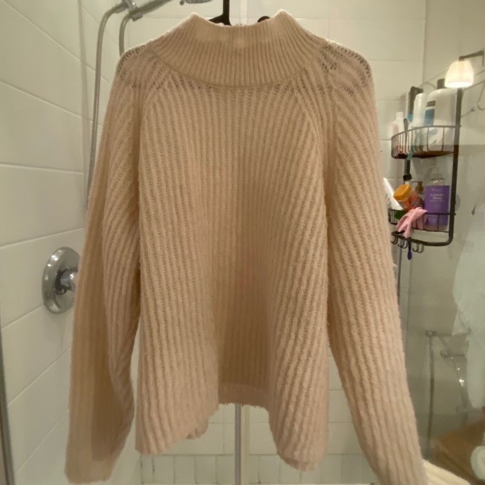 Knitted white sweater